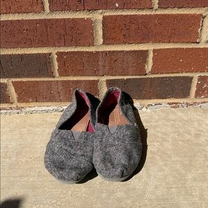 Toms Black and White Slip-On Shoes